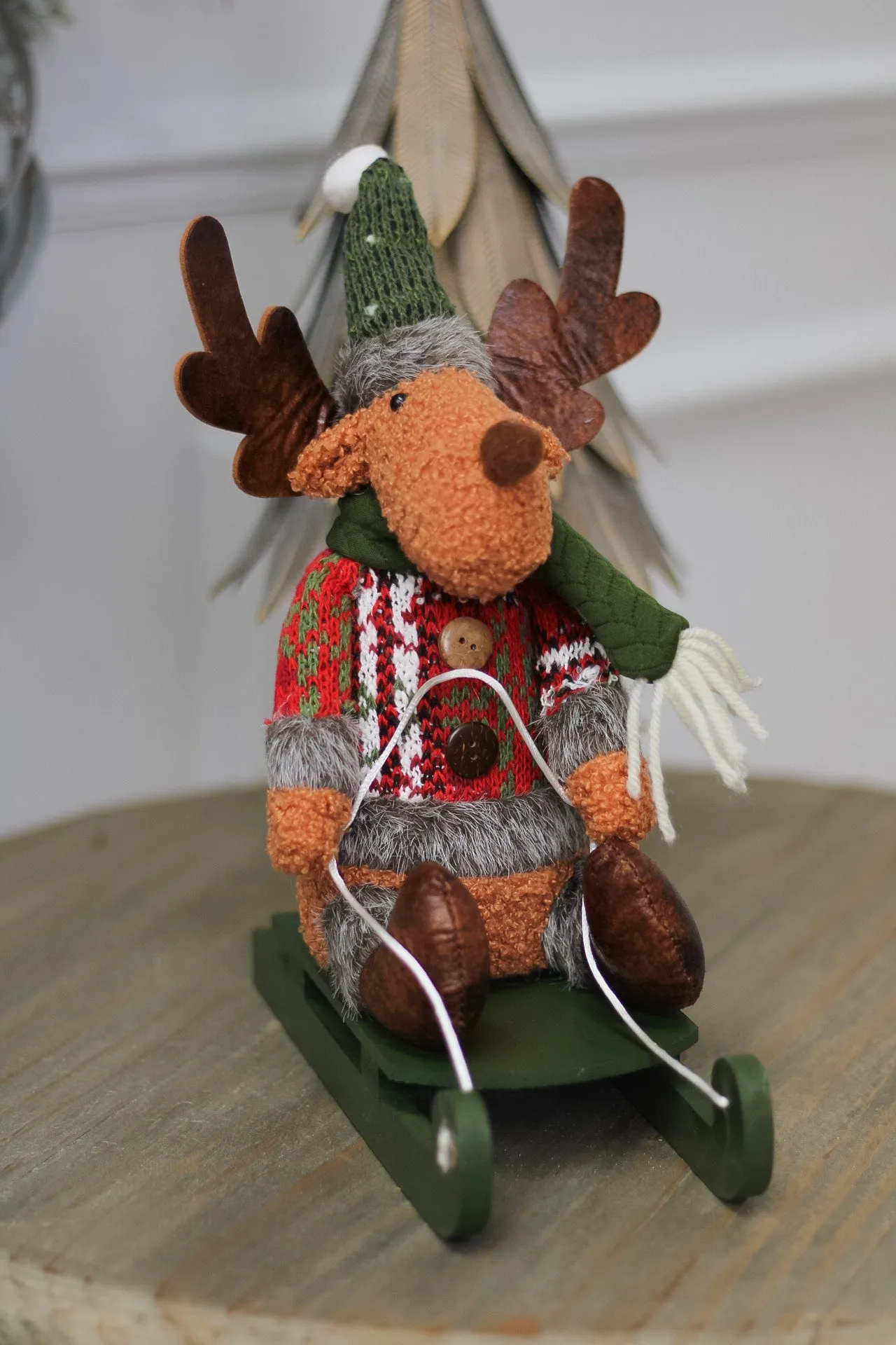 Dasher Reindeer on Green Wooden Sleigh