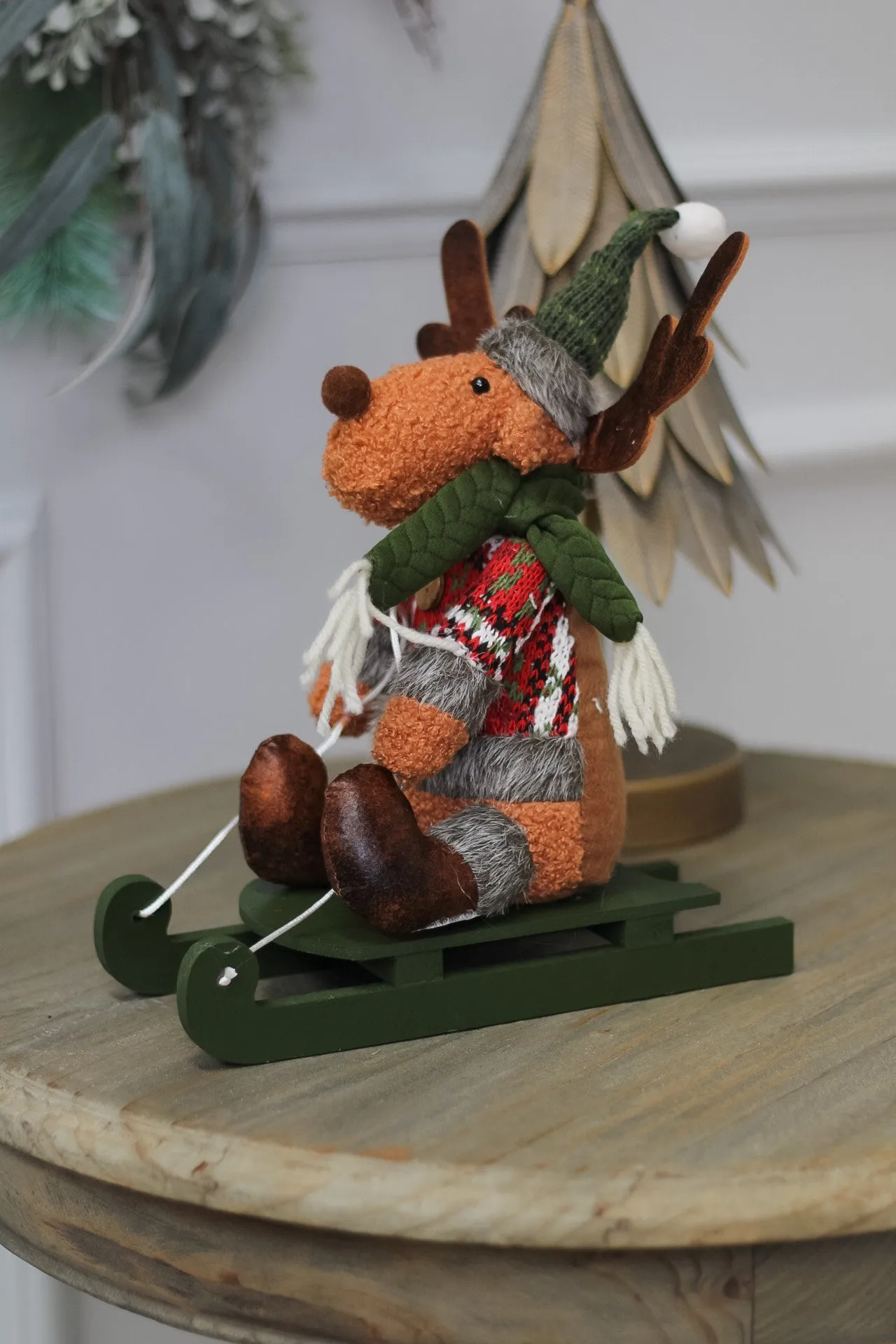 Dasher Reindeer on Green Wooden Sleigh