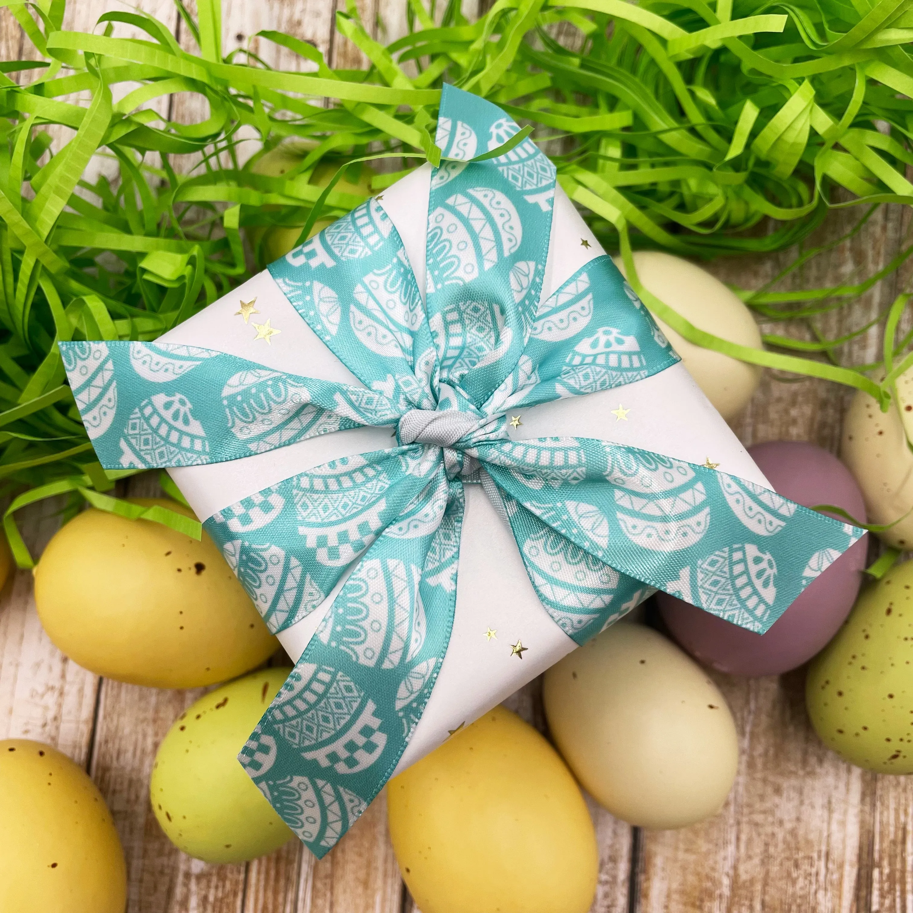 Easter Egg Ribbon stencil print in white with a lavender, pink or teal background printed on7/8" white satin