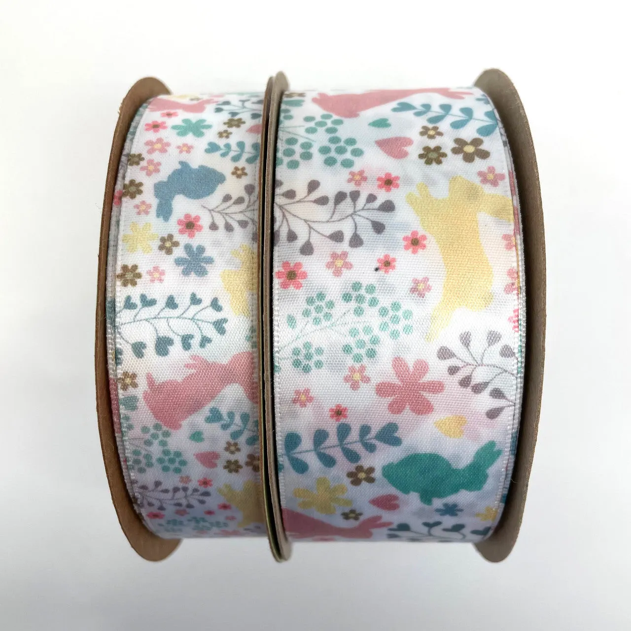 Easter ribbon pastel bunnies hopping in the flora in Spring shades of yellow, pink and blue printed on 7/8" and 1.5"  white satin